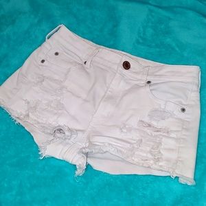 Ripped, white jean shorts